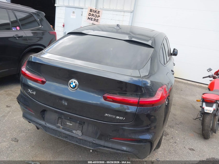 2019 BMW X4 VIN 5UXUJ3C56KLA58494 IAAI salvage auction — STRIPPED, Salvage Title, sold $1,550 on 2026-07-21 (photo 4)