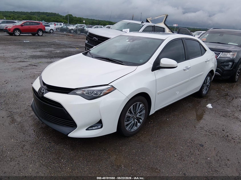 2017 Toyota Corolla VIN 5YFBURHE9HP612037 IAAI salvage auction — HAIL, Clear (Oklahoma), sold $8,500 on 2026-08-01 (photo 2)