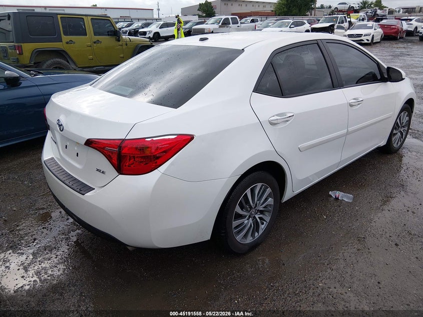2017 Toyota Corolla VIN 5YFBURHE9HP612037 IAAI salvage auction — HAIL, Clear (Oklahoma), sold $8,500 on 2026-08-01 (photo 4)