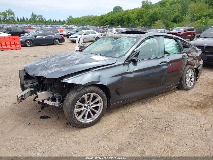 2015 BMW 3er VIN WBA8Z5C57FD672195 IAAI salvage auction — ROLLOVER, Salvage (Illinois), sold $425 on 2026-07-08 (photo 2)