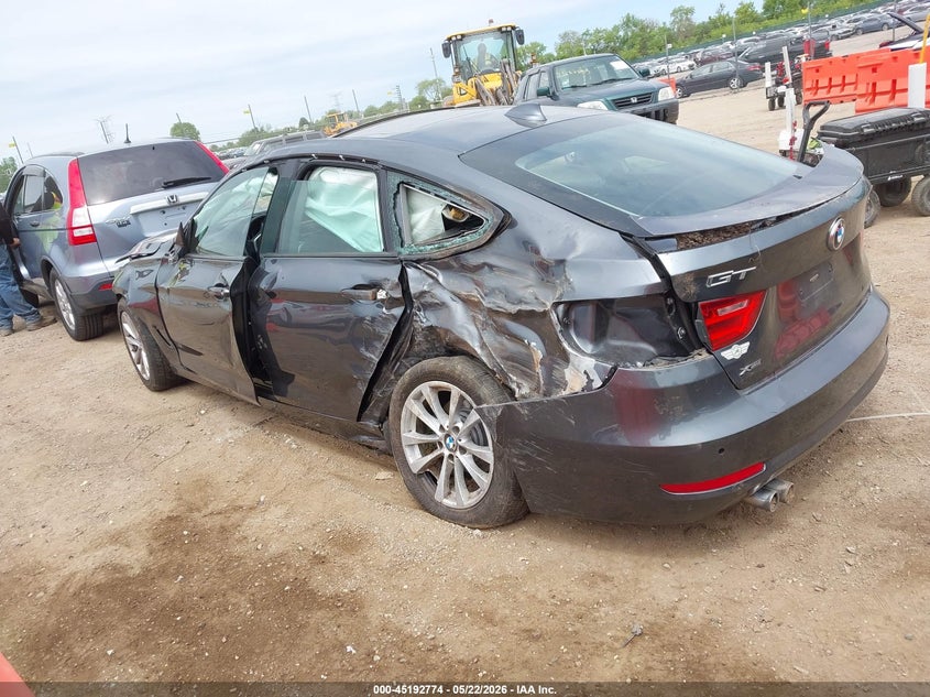 2015 BMW 3er VIN WBA8Z5C57FD672195 IAAI salvage auction — ROLLOVER, Salvage (Illinois), sold $425 on 2026-07-08 (photo 3)