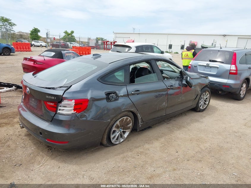 2015 BMW 3er VIN WBA8Z5C57FD672195 IAAI salvage auction — ROLLOVER, Salvage (Illinois), sold $425 on 2026-07-08 (photo 4)
