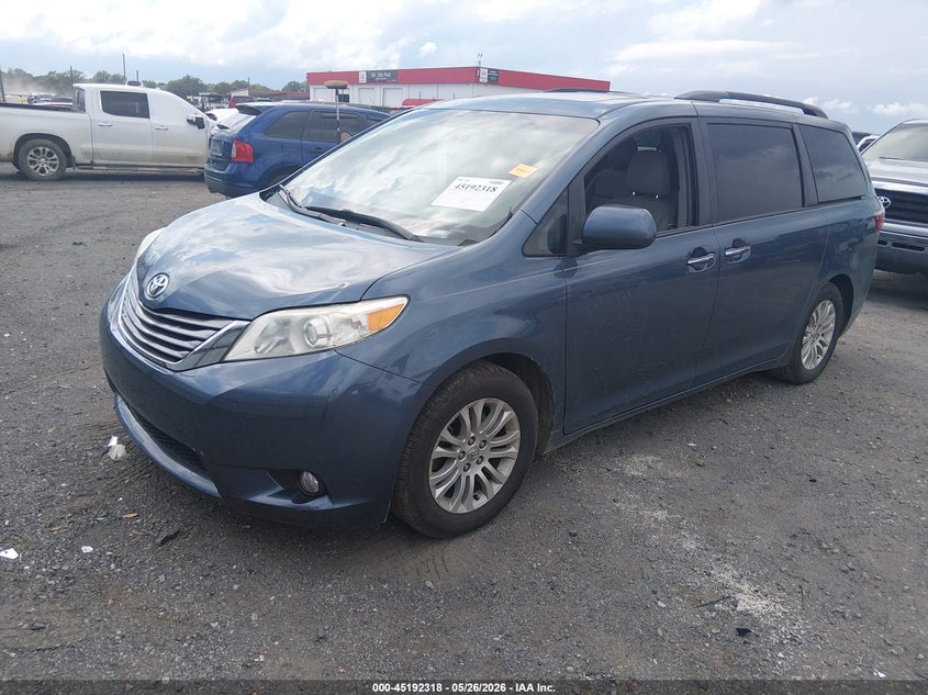2015 Toyota Sienna VIN 5TDYK3DCXFS684953 IAAI salvage auction — STORM DAMAGE, Salvage (Arkansas), sold $5,150 on 2026-07-15 (photo 2)