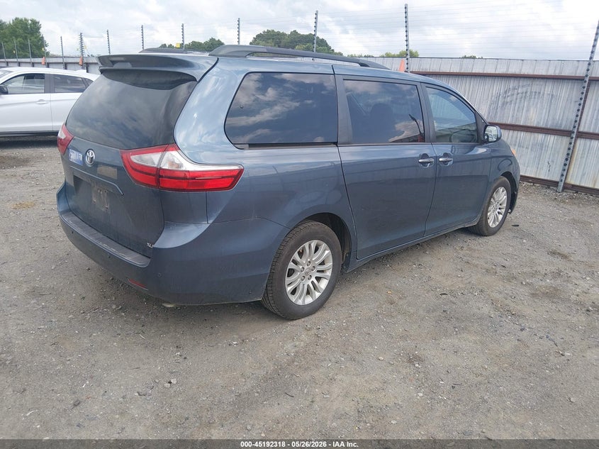 2015 Toyota Sienna VIN 5TDYK3DCXFS684953 IAAI salvage auction — STORM DAMAGE, Salvage (Arkansas), sold $5,150 on 2026-07-15 (photo 4)