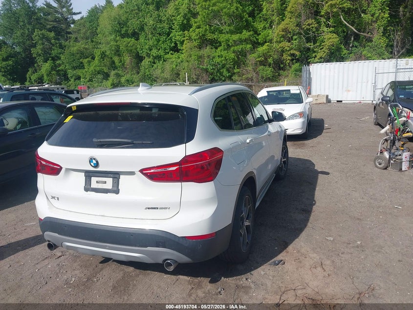 2019 BMW X1 VIN WBXHT3C50K5L37117 IAAI salvage auction — ENGINE DAMAGE, Salvage Title, sold $4,700 on 2026-07-28 (photo 4)