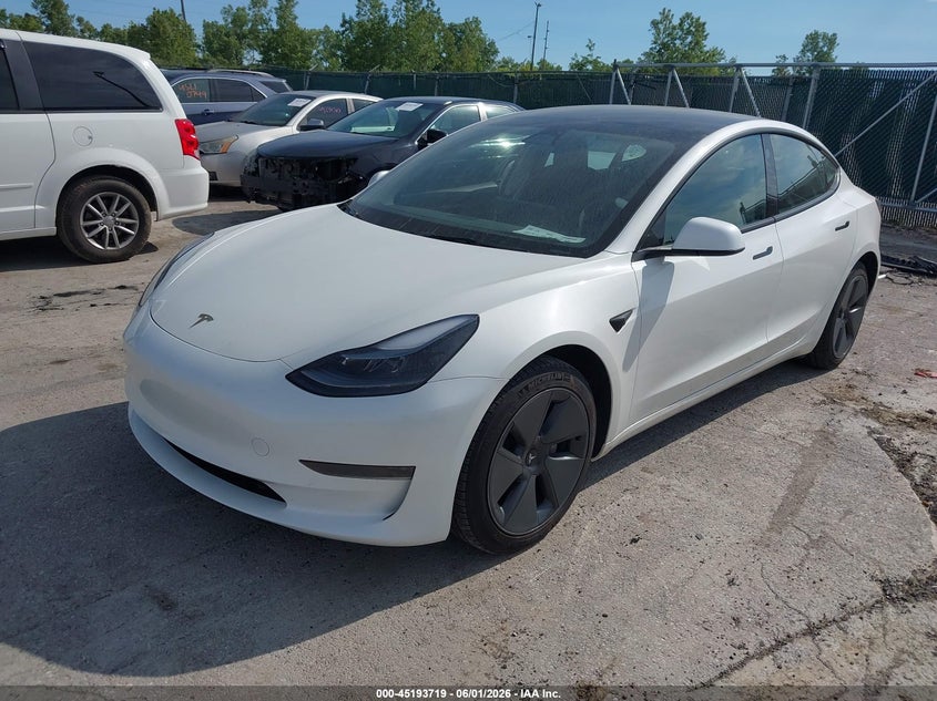 2023 Tesla Model 3 VIN 5YJ3E1EA9PF568801 IAAI salvage auction — SIDE, Salvage Title, sold $8,900 on 2026-07-15 (photo 2)
