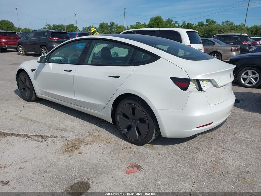 2023 Tesla Model 3 VIN 5YJ3E1EA9PF568801 IAAI salvage auction — SIDE, Salvage Title, sold $8,900 on 2026-07-15 (photo 3)