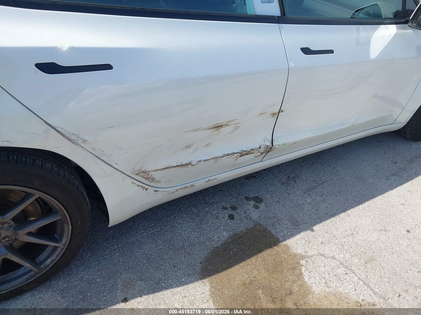 2023 Tesla Model 3 VIN 5YJ3E1EA9PF568801 IAAI salvage auction — SIDE, Salvage Title, sold $8,900 on 2026-07-15 (photo 6)