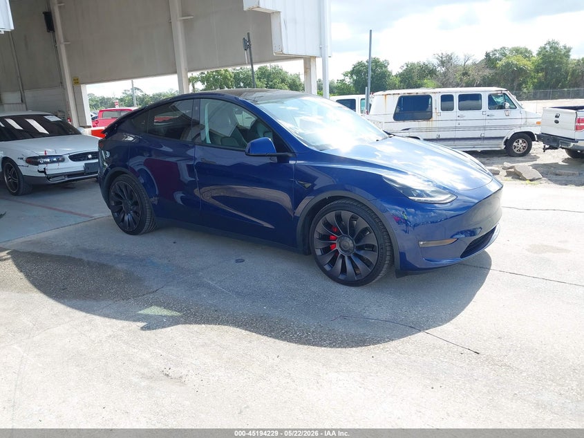 2022 Tesla Model y VIN 7SAYGDEF6NF382419 IAAI salvage auction — REAR END, Rebuildable (Florida), sold $11,950 on 2026-07-09 (photo 1)