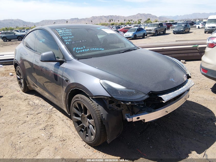 2023 Tesla Model y VIN 7SAYGAEE2PF668955 IAAI salvage auction — FRONT END, Salvage Title, sold $9,200 on 2026-07-11 (photo 1)