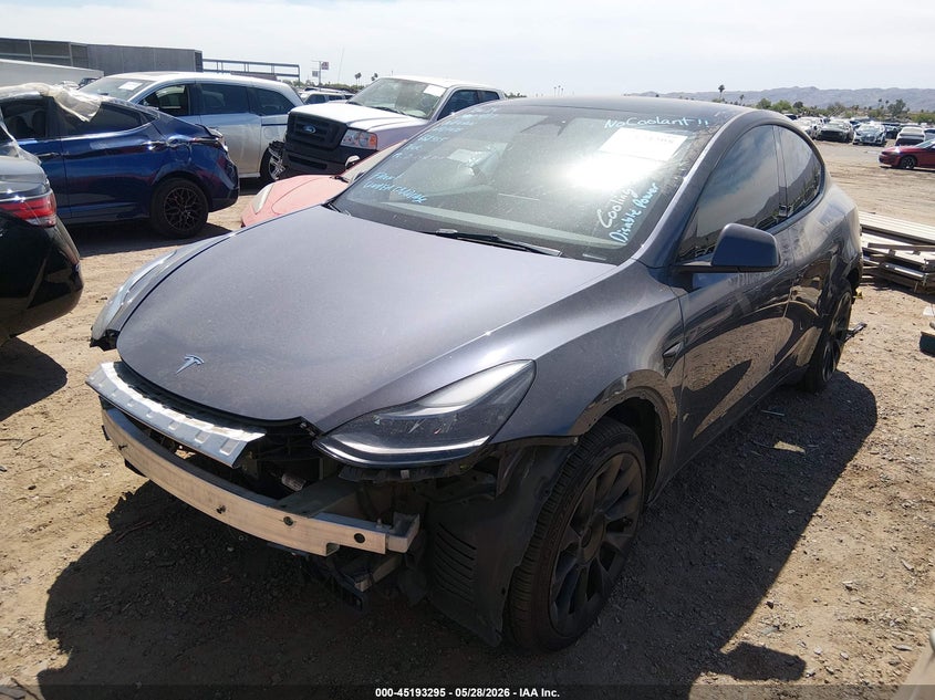 2023 Tesla Model y VIN 7SAYGAEE2PF668955 IAAI salvage auction — FRONT END, Salvage Title, sold $9,200 on 2026-07-11 (photo 2)