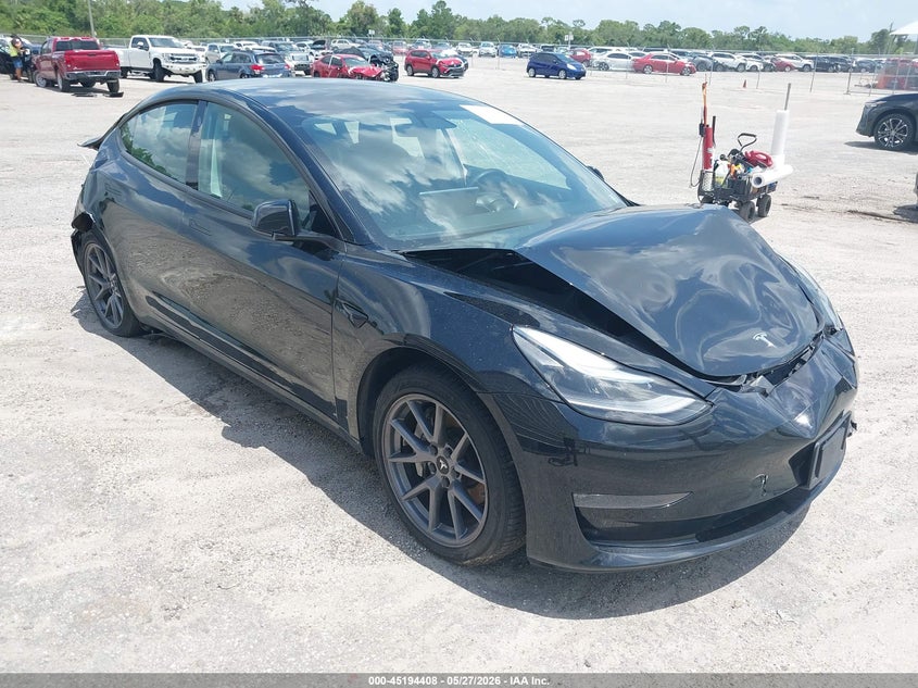 2022 Tesla Model 3 VIN 5YJ3E1EB9NF126106 IAAI salvage auction — FRONT & REAR, Salvage Title, sold $50 on 2026-07-23 (photo 1)