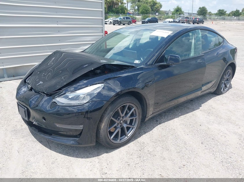 2022 Tesla Model 3 VIN 5YJ3E1EB9NF126106 IAAI salvage auction — FRONT & REAR, Salvage Title, sold $50 on 2026-07-23 (photo 2)