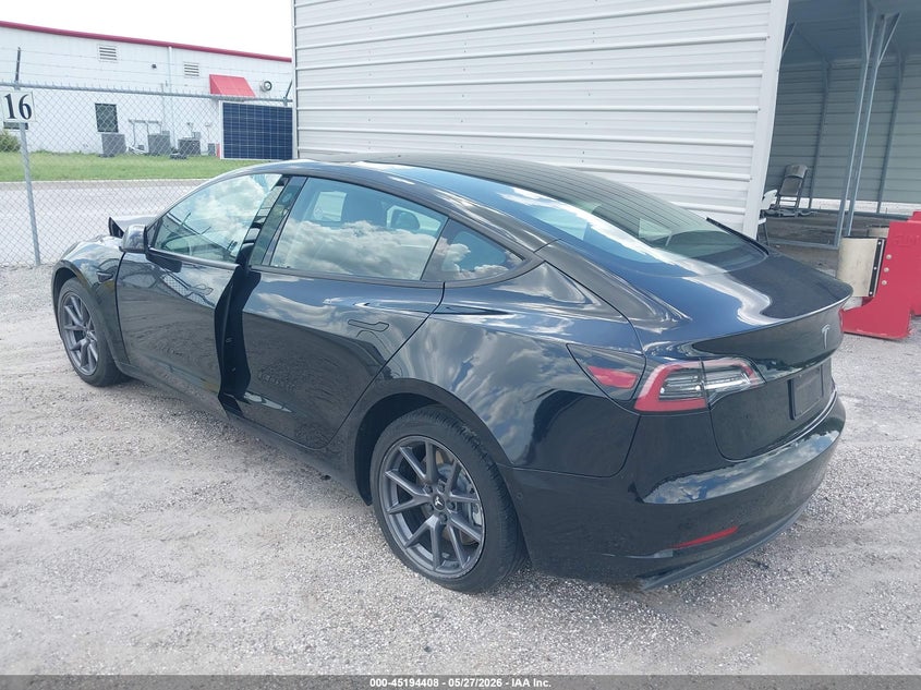 2022 Tesla Model 3 VIN 5YJ3E1EB9NF126106 IAAI salvage auction — FRONT & REAR, Salvage Title, sold $50 on 2026-07-23 (photo 3)