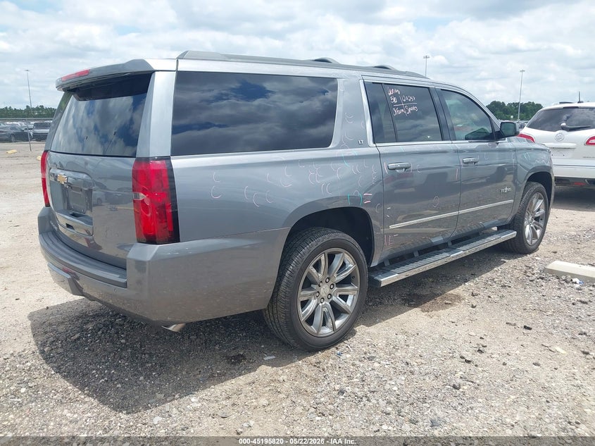 2019 Chevrolet Suburban VIN 1GNSCHKC1KR262282 IAAI salvage auction — HAIL, Original (Texas), sold $7,100 on 2026-07-09 (photo 4)