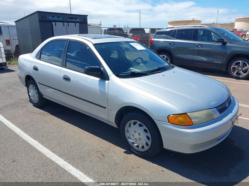 1998 Mazda Protege VIN JM1BC1416W0208370 IAAI salvage auction — NORMAL WEAR, Clear (Hawaii), sold $1,700 on 2026-07-14 (photo 1)