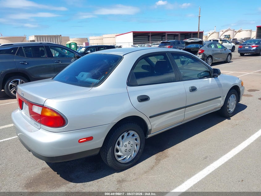 1998 Mazda Protege VIN JM1BC1416W0208370 IAAI salvage auction — NORMAL WEAR, Clear (Hawaii), sold $1,700 on 2026-07-14 (photo 4)