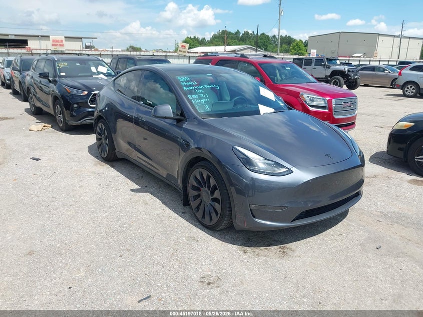 2023 Tesla Model y VIN 7SAYGDEF4PF838761 IAAI salvage auction — SIDE, Salvage Title, sold $12,300 on 2026-07-08 (photo 1)