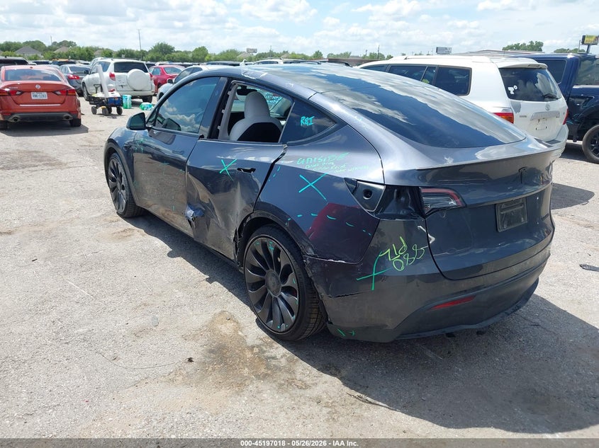 2023 Tesla Model y VIN 7SAYGDEF4PF838761 IAAI salvage auction — SIDE, Salvage Title, sold $12,300 on 2026-07-08 (photo 3)