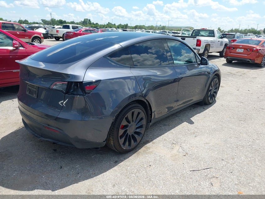 2023 Tesla Model y VIN 7SAYGDEF4PF838761 IAAI salvage auction — SIDE, Salvage Title, sold $12,300 on 2026-07-08 (photo 4)