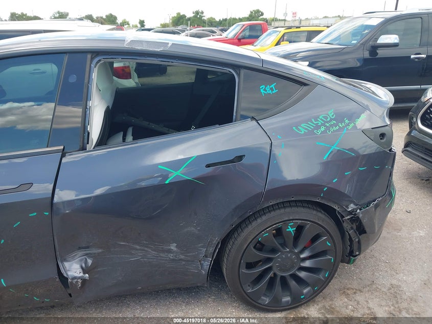2023 Tesla Model y VIN 7SAYGDEF4PF838761 IAAI salvage auction — SIDE, Salvage Title, sold $12,300 on 2026-07-08 (photo 6)