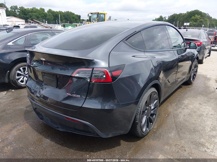 2024 Tesla Model y VIN 7SAYGDEF1RF034906 IAAI salvage auction — REAR END, Salvage Title, sold $17,000 on 2026-07-09 (photo 4)