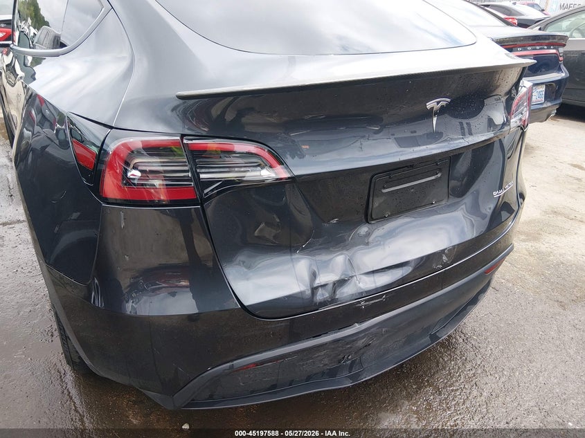 2024 Tesla Model y VIN 7SAYGDEF1RF034906 IAAI salvage auction — REAR END, Salvage Title, sold $17,000 on 2026-07-09 (photo 6)