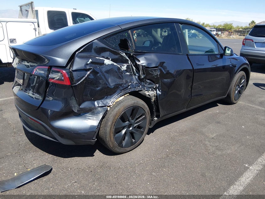 2024 Tesla Model y VIN 7SAYGAEE5RF112142 IAAI salvage auction — RIGHT REAR, Salvage Title, sold $13,500 on 2026-07-16 (photo 4)