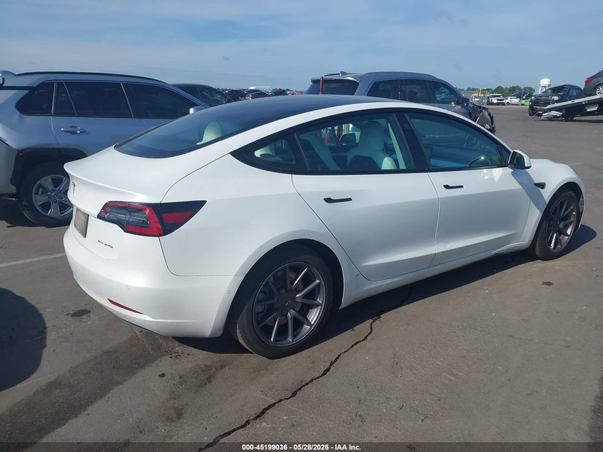 2021 Tesla Model 3 VIN 5YJ3E1EBXMF059692 IAAI salvage auction — REAR END, Salvage Title, sold $6,600 on 2026-07-23 (photo 4)
