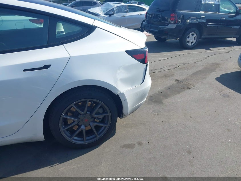 2021 Tesla Model 3 VIN 5YJ3E1EBXMF059692 IAAI salvage auction — REAR END, Salvage Title, sold $6,600 on 2026-07-23 (photo 6)