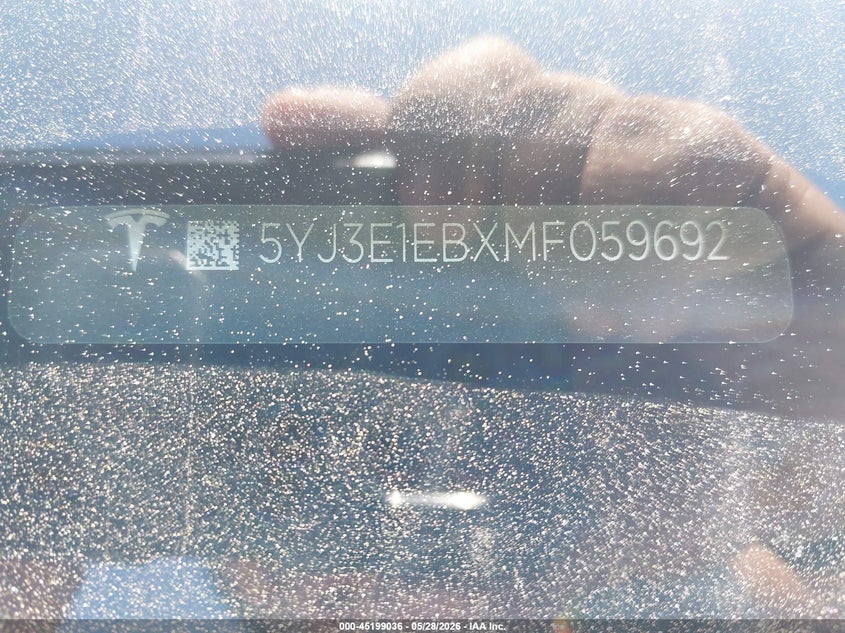 2021 Tesla Model 3 VIN 5YJ3E1EBXMF059692 IAAI salvage auction — REAR END, Salvage Title, sold $6,600 on 2026-07-23 (photo 9)