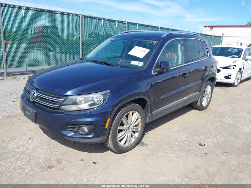 2014 Volkswagen Tiguan VIN WVGBV3AX3EW544726 IAAI salvage auction — LEFT FRONT, Salvage Title, sold $400 on 2026-07-21 (photo 2)