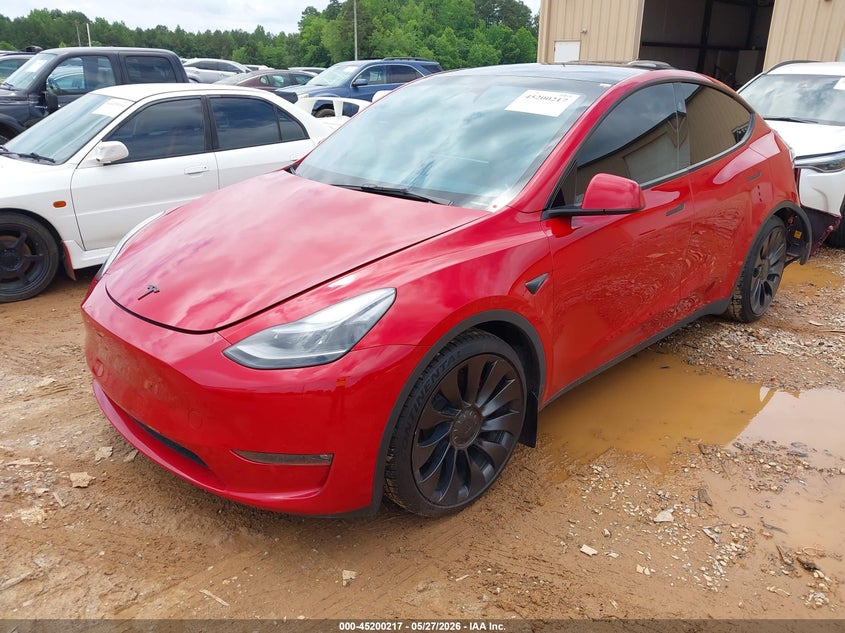 2023 Tesla Model y VIN 7SAYGDEFXPF900678 IAAI salvage auction — REAR END, Salvage Title, sold $11,800 on 2026-07-23 (photo 2)