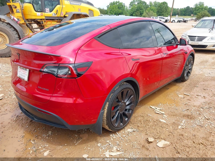 2023 Tesla Model y VIN 7SAYGDEFXPF900678 IAAI salvage auction — REAR END, Salvage Title, sold $11,800 on 2026-07-23 (photo 4)