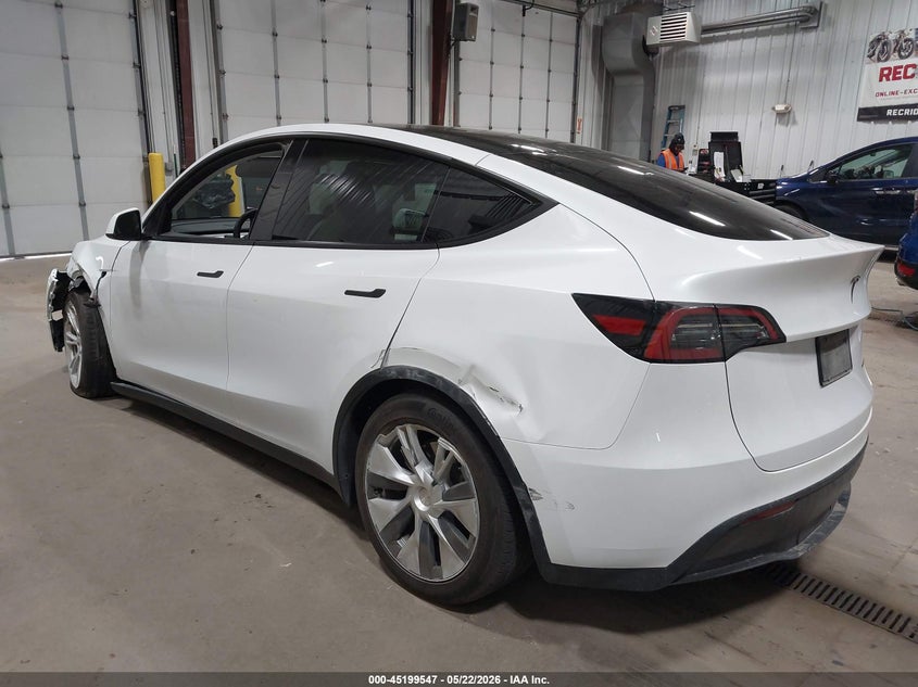 2023 Tesla Model y VIN 7SAYGDEE6PF675621 IAAI salvage auction — SUSPENSION, Salvage (North Dakota), sold $8,900 on 2026-07-24 (photo 3)