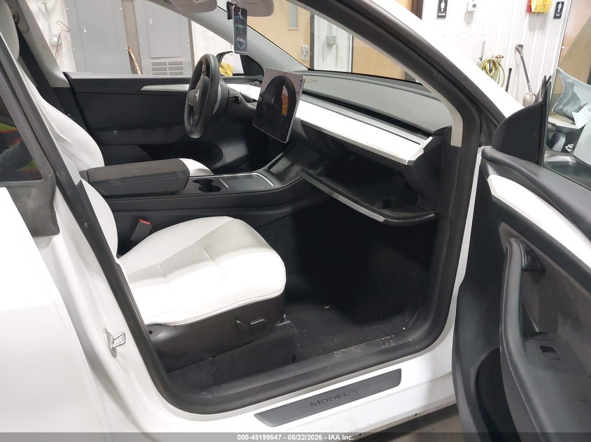 2023 Tesla Model y VIN 7SAYGDEE6PF675621 IAAI salvage auction — SUSPENSION, Salvage (North Dakota), sold $8,900 on 2026-07-24 (photo 5)