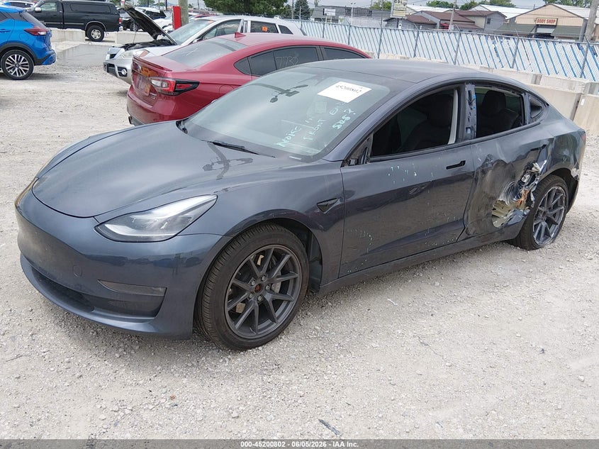 2022 Tesla Model 3 VIN 5YJ3E1EB0NF159107 IAAI salvage auction — LEFT REAR, Salvage (Illinois), sold $7,175 on 2026-07-28 (photo 2)