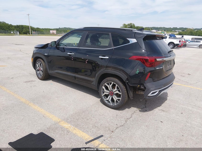 2023 Kia Seltos VIN KNDETCA29P7352896 IAAI salvage auction — FRONT & REAR, Salvage (Kansas), sold $4,775 on 2026-08-01 (photo 3)