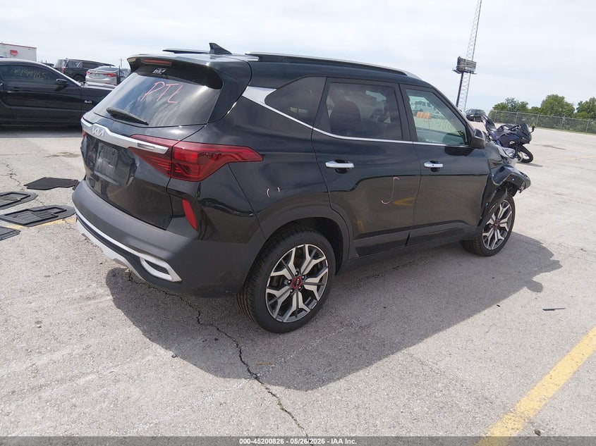 2023 Kia Seltos VIN KNDETCA29P7352896 IAAI salvage auction — FRONT & REAR, Salvage (Kansas), sold $4,775 on 2026-08-01 (photo 4)