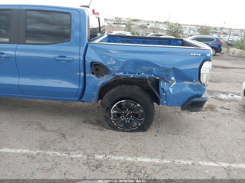 2025 Gmc Canyon VIN 1GTP2BEK3S1242390 IAAI salvage auction — SIDE, Salvage Title, sold $13,600 on 2026-07-10 (photo 6)