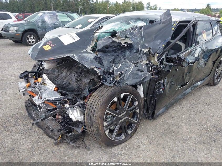 2025 Kia Ev6 VIN 5XYC4DJC8SG003341 IAAI salvage auction — BIOHAZARD/CHEMICAL, Salvage Title, sold $2,500 on 2026-07-22 (photo 6)