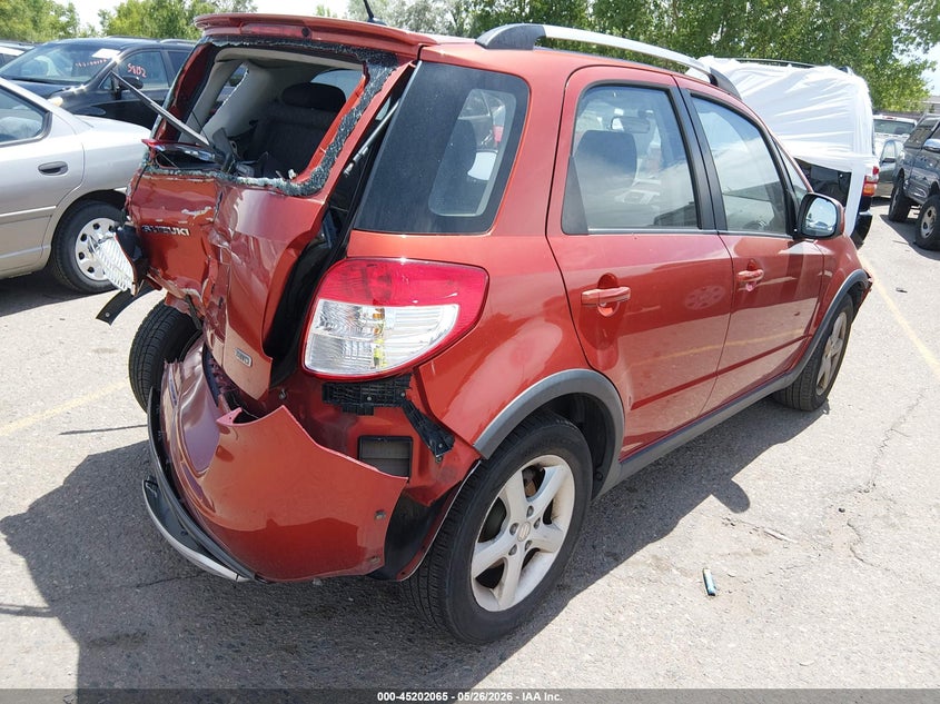 2009 Suzuki Sx4 VIN JS2YB417695100996 IAAI salvage auction — REAR END, Salvage (Colorado), sold $250 on 2026-07-17 (photo 4)