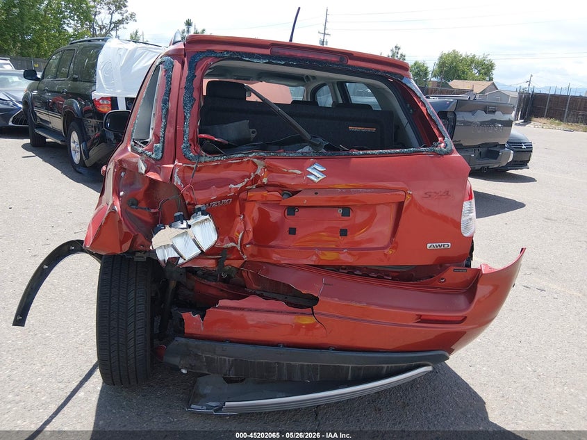 2009 Suzuki Sx4 VIN JS2YB417695100996 IAAI salvage auction — REAR END, Salvage (Colorado), sold $250 on 2026-07-17 (photo 6)