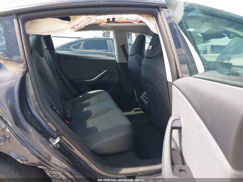 2025 Tesla Model 3 VIN 5YJ3E1EA9SF132975 IAAI salvage auction — RIGHT REAR, Salvage (Texas), sold $10,300 on 2026-07-30 (photo 8)