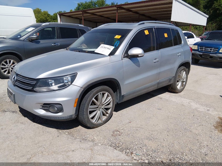 2013 Volkswagen Tiguan VIN WVGAV3AX9DW562948 IAAI salvage auction — NORMAL WEAR, Original (Texas), sold $550 on 2026-07-27 (photo 2)