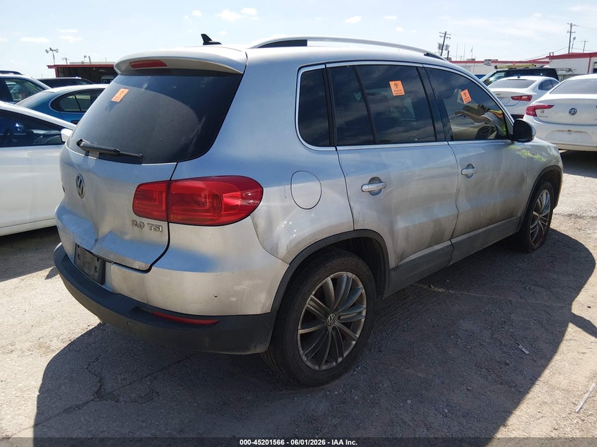 2013 Volkswagen Tiguan VIN WVGAV3AX9DW562948 IAAI salvage auction — NORMAL WEAR, Original (Texas), sold $550 on 2026-07-27 (photo 4)