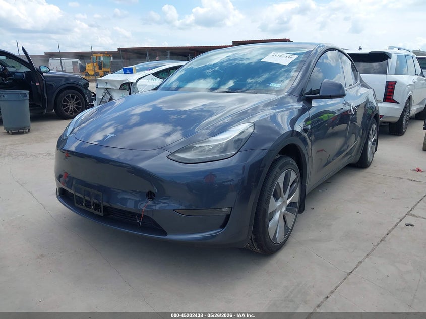 2023 Tesla Model y VIN 7SAYGAEEXPF941527 IAAI salvage auction — RIGHT SIDE, Salvage Title, sold $11,750 on 2026-07-30 (photo 2)