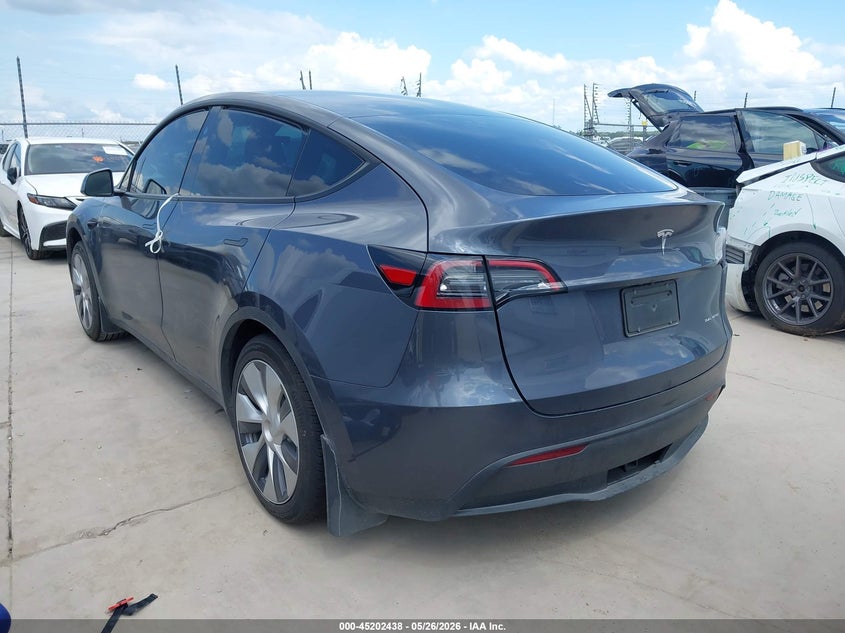 2023 Tesla Model y VIN 7SAYGAEEXPF941527 IAAI salvage auction — RIGHT SIDE, Salvage Title, sold $11,750 on 2026-07-30 (photo 3)