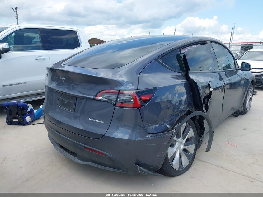 2023 Tesla Model y VIN 7SAYGAEEXPF941527 IAAI salvage auction — RIGHT SIDE, Salvage Title, sold $11,750 on 2026-07-30 (photo 4)