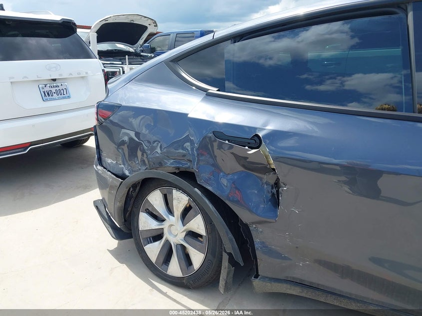2023 Tesla Model y VIN 7SAYGAEEXPF941527 IAAI salvage auction — RIGHT SIDE, Salvage Title, sold $11,750 on 2026-07-30 (photo 6)